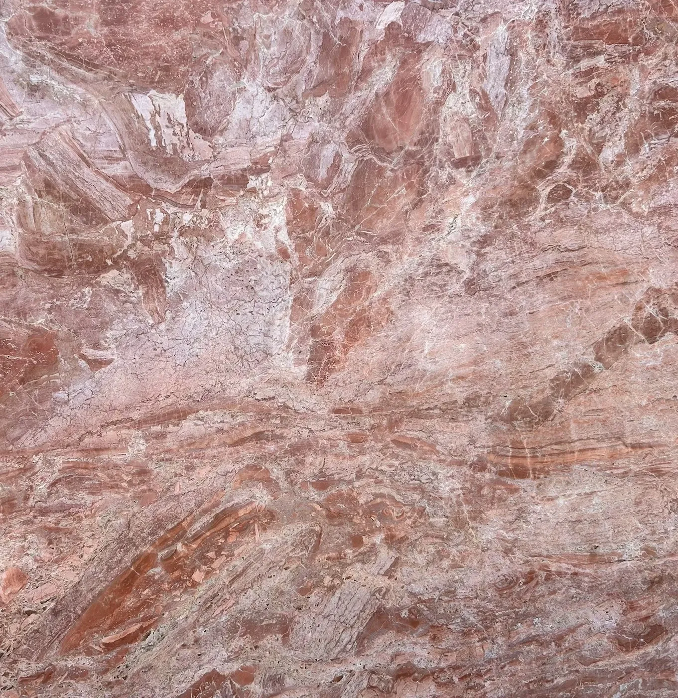 Pink marble with intricate natural patterns.